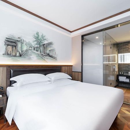 Nost Algia Hotel Near Beijing Panjiayuan Antique Market- Beijing Happy Valley, Cbd, China Zun And Sanlitun, Tian'Anmen Square, Free Ice Cream, Mineral Water, Coffee, Snacks And Laundry Service, Free Gymnastic, English Communication Well מראה חיצוני תמונה